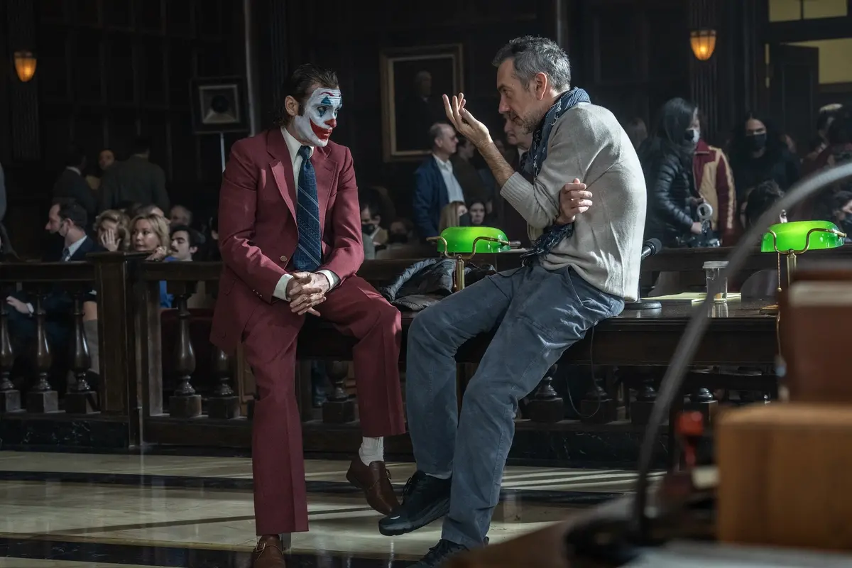 JOAQUIN PHOENIX and director Todd Phillips on the set of Warner Bros. Pictures’ “JOKER: FOLIE À DEUX,” a Warner Bros. Pictures release